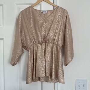 Gilli peplum blouse in animal print.